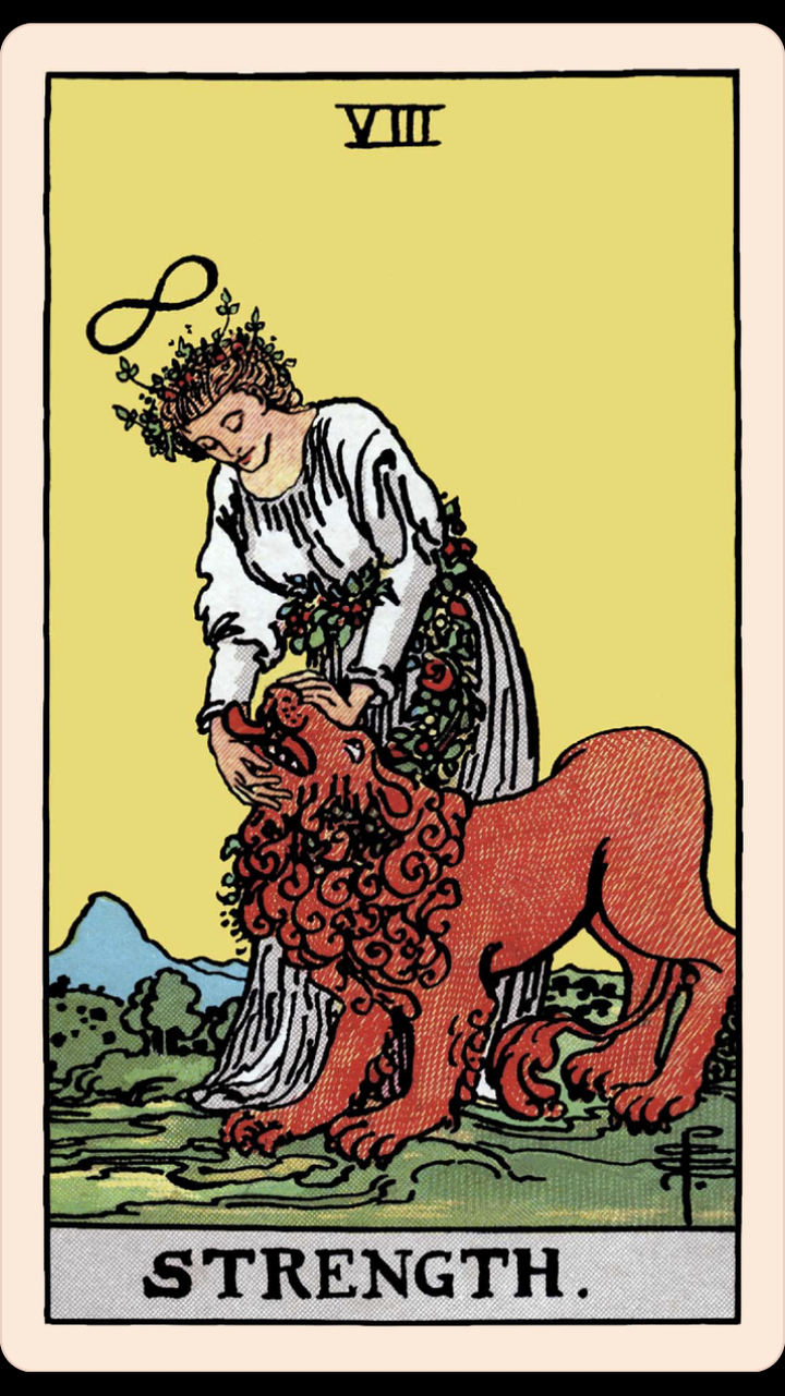 A woman in a long white dress with an infinity sign above her head holds the mouth of a lion in an effort to charm and tame i